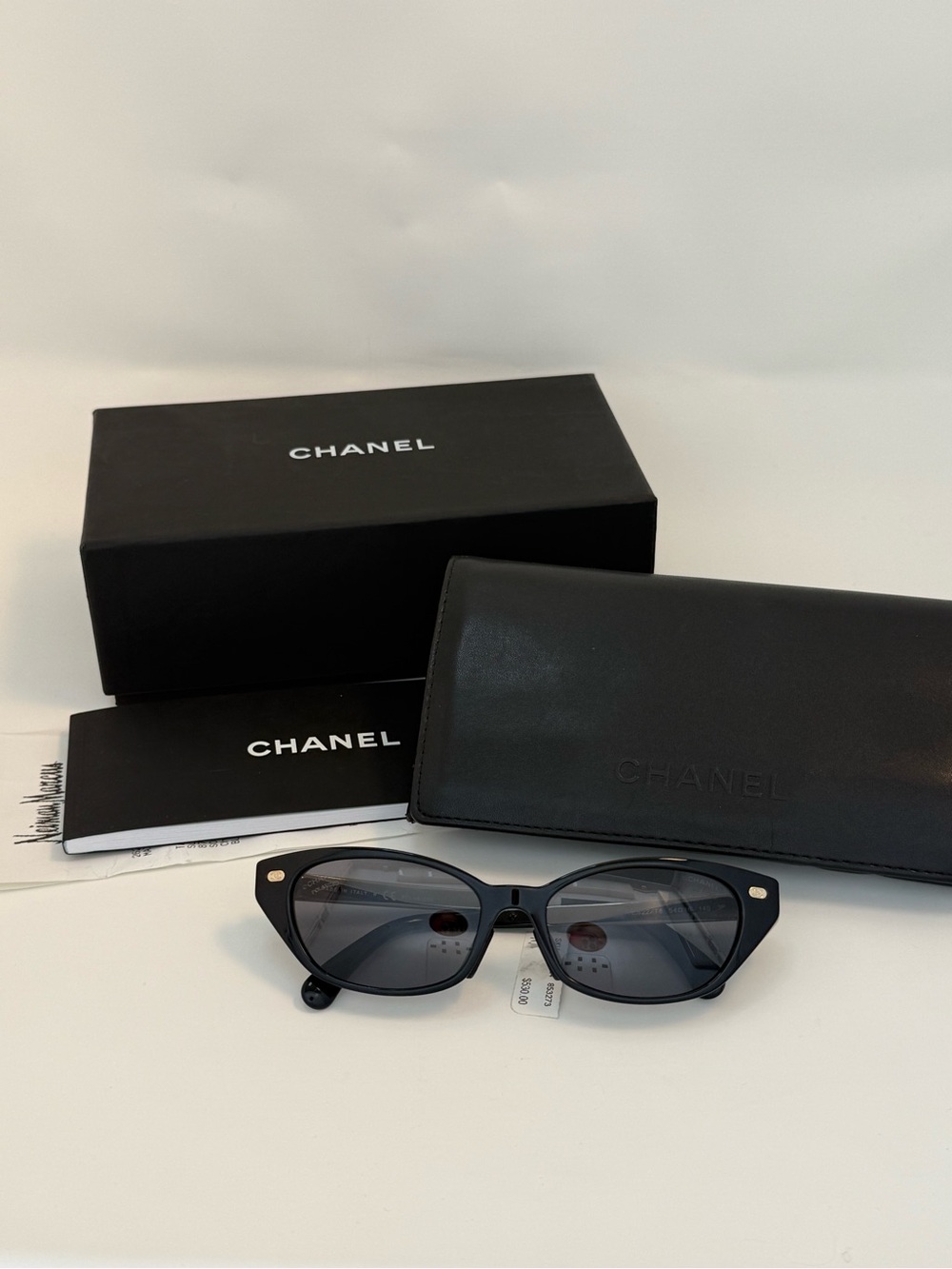 CHANEL Black Cat-Eye Sunglasses with Dark Lenses